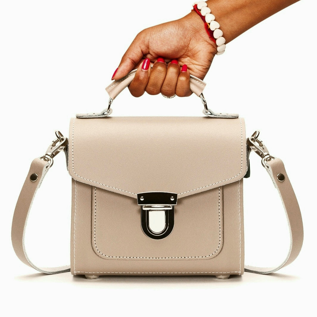 Zatchels Sugarcube Leather Handbag in Iced Coffee, shown worn by a model